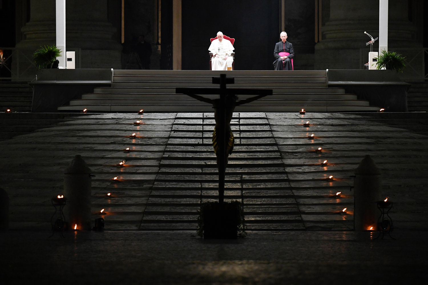 Pope Francis leads the Via Crucis procession in St. Peter’s Square at the Vatican April 10, 2020. The Good Friday service was held with no public participation because of the COVID-19 pandemic.